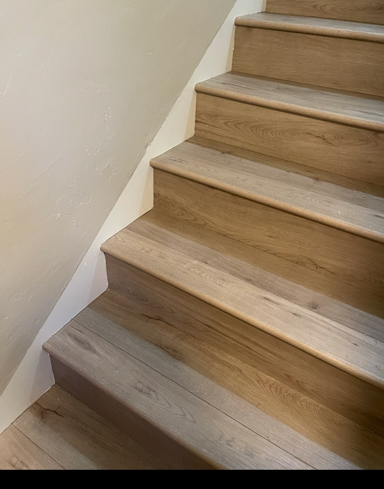 Finished staircase flooring